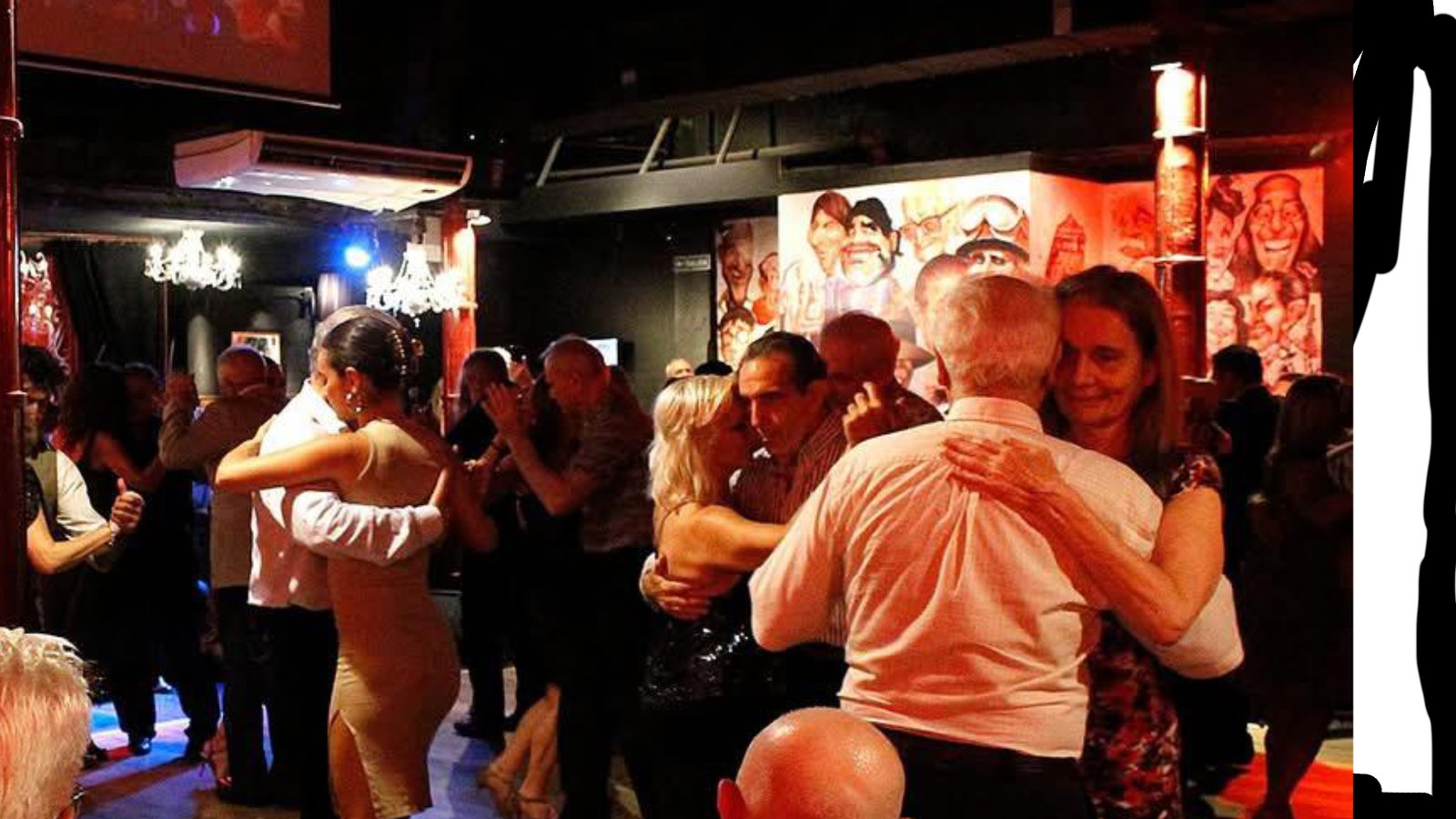 Bailarines en milonga porteña